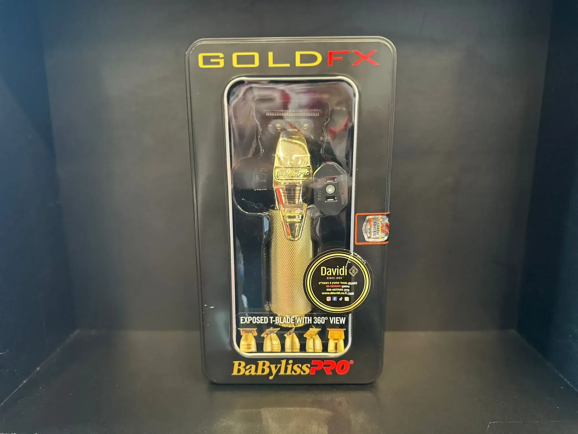 מכונת תספורת BabylissPRO GOLD FX באריזת קנייה, מתאימה לשימוש מקצועי במספרות.